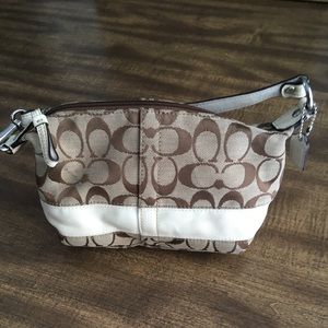 Tan mini Coach purse